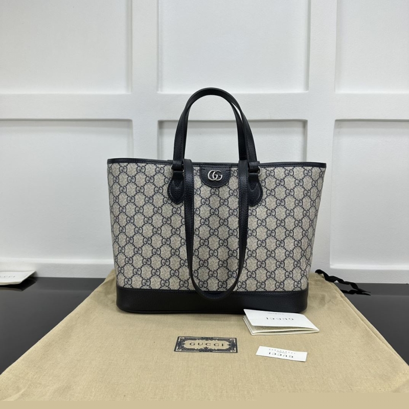 G*u*i shopping bags